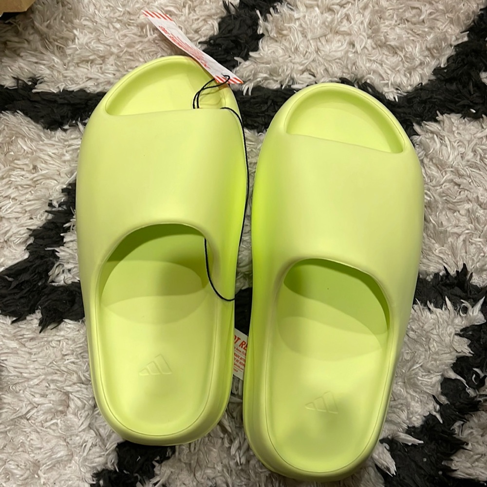 Yeezy slides. Brand new. Size 7 mens. I’m an 8 in womens.